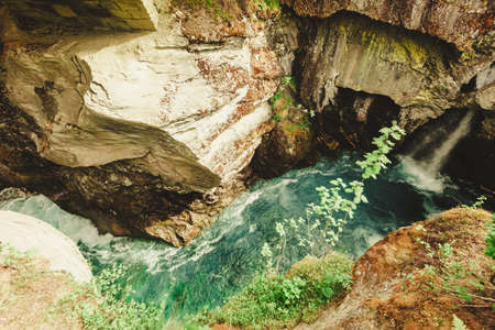 Tourist attraction in Norway, Europe. Gudbrandsjuvet waterfalls located in the Valldalen valley, between Valldal and Trollstigenの写真素材