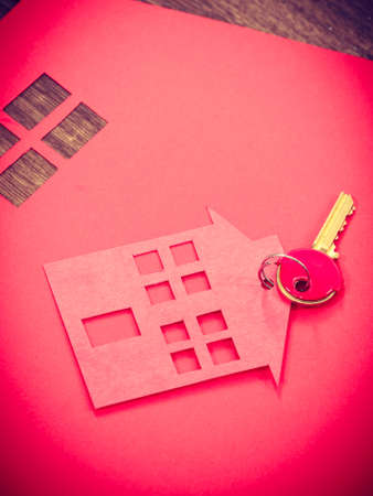 Security ownership property accesst real estate concept. House cutout with keys. Home symbols lying on floor.の写真素材