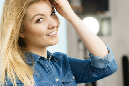 Happiness face expressions concept. Portrait of happy cheerful blonde woman smiling with joyの写真素材