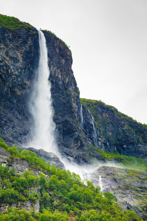 Travel, holidays. Beauty in nature. Waterfalls in summer norwegian mountains