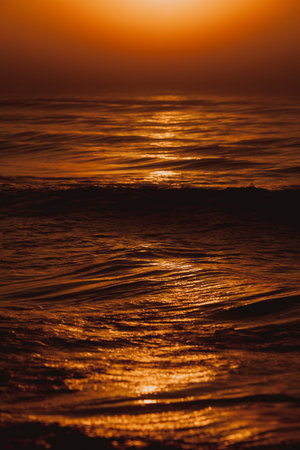 Amazing colorful red sunset over evening sea horizon. Tranquil scene. Natural background. Landscape.