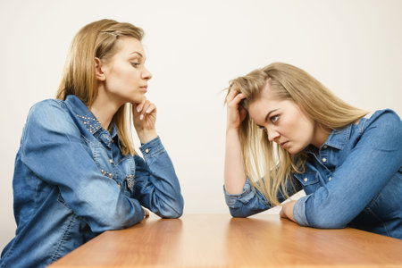 Two women having argue mocking up being mad at each other. Female telling off, ignorance concept.