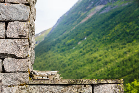 Grill trays on rocks and stones table in nature. Meal during traveling through Scandinavia