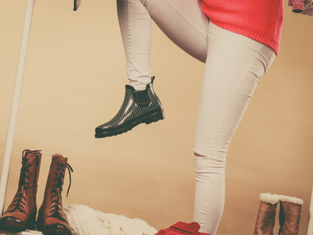 Fashionable style, trendy clothes, thinking about clothing concept. Blonde woman standing in...