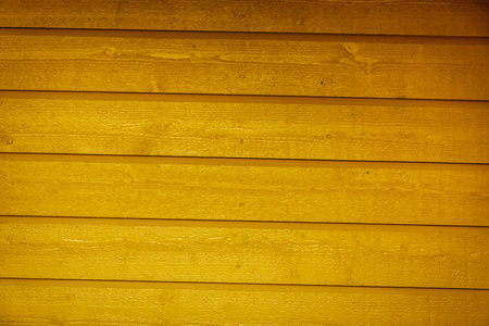 Textures and patterns close up concept. Detailed closeup of brown wooden board textureの写真素材