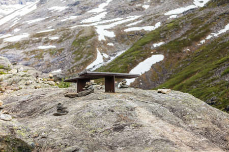 Tourism vacation and travel. Serene mountains landscape with rest place benches, Norway Europe.の写真素材