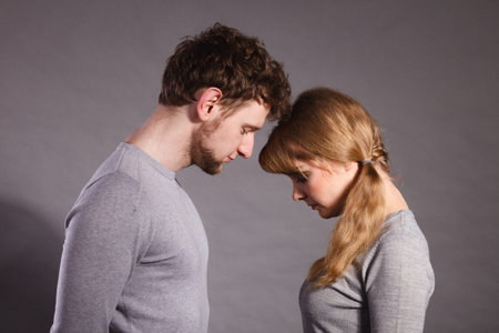 Depression and sadness concept. Unhappy depressed couple after argument. Sad woman and disappointed...