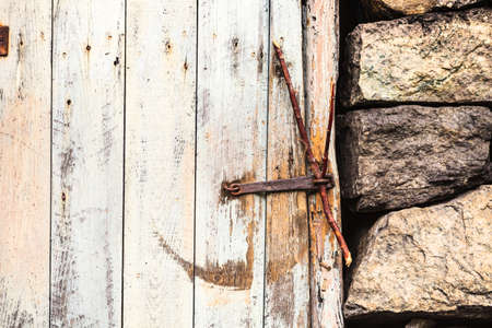The Helleren houses in Jossingfjord along road 44 between Egersund and Flekkefjord, Sokndal municipality, Norway. Detailed view old wooden doorの写真素材