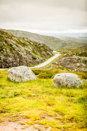 Lysevegen road running through summer norwegian mountains, located in Rogaland county. Beautiful landscape. Travel and tourism.の写真素材