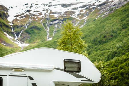 Tourism vacation and travel. Camper van and norwegian mountains landscapeの写真素材