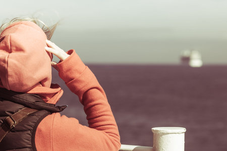 Travel holiday and tourism. Tourist woman on cruise ship boat enjoying open ocean view, seascape...