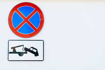 No stopping clearway car tow warning sign on isolated white background. Traffic regulations conceptの写真素材