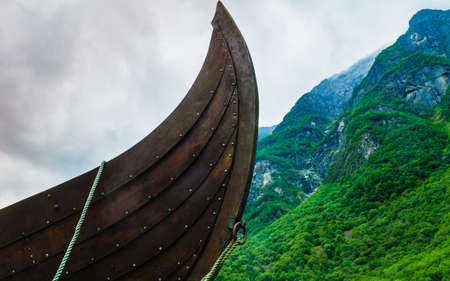 Part of old wooden viking boat in norwegian nature. Tourism and traveling conceptの写真素材