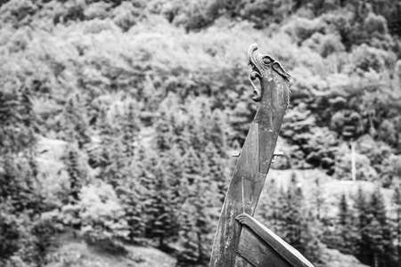 Part of old wooden viking boat in norwegian nature. Tourism and traveling conceptの写真素材