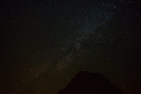 Stars captured on dark night black navy blue sky. Universe, galaxy, cosmos concept.