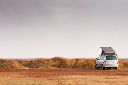 Tourism vacation and travel. Camper van on nature in summer time, Greece.