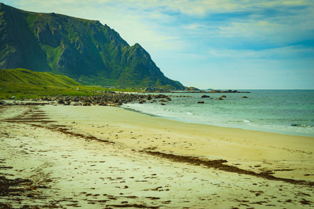 Seascape, sea coast with sandy beach in resort Bleik. Andoya Norway. Vesteralen archipelago.