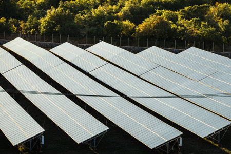 Long black dark solar panels outdoor. Ecological objects, renewable energy sources concept.