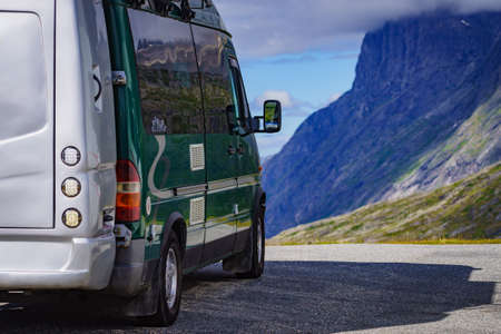 Camper car in mountains on roadside. Camping on trip. Norway Scandinavia Europe.の写真素材