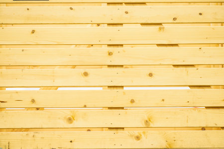 Background pattern made of wooden brown plank boards, vintage retro industrial design texture.