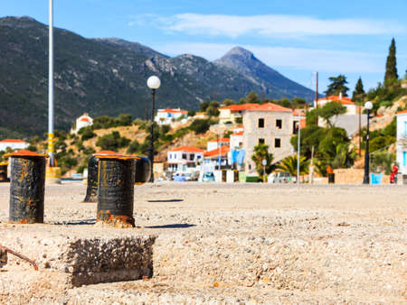 Jetty objects concept. Old rusty harbor marina bolt for ship and boats ropes, outdoor shotの写真素材