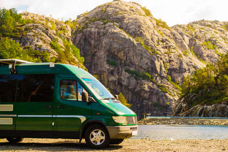 Tourism vacation and travel. Camper van in summer mountains landscape, Norwayの写真素材