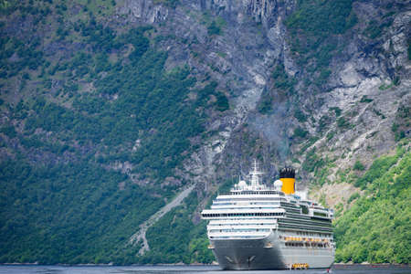 Fjord Geirangerfjord with ferry boat, Norway. Travel cruising.の写真素材