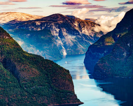 Amazing dramatic view of the fjords and mountains. Aurlandsfjord fjord landscape in Norway Scandinavia. National tourist road known as The snow road.の写真素材