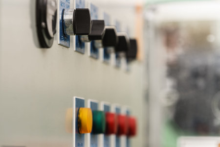 Detailed close up of many colorful buttons in vehicle, an agricultural machine