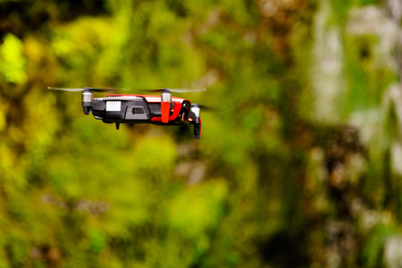 Drone flying against norwegian nature, take photo and video