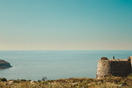 Greek castles. The castle of Kelefa and sea bay of Oitylo in the background, Mani, Laconia, Greece.