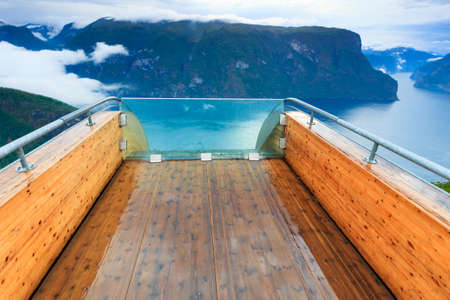 Aurlandsfjord landscape from Stegastein viewing point, clouds over sea water surface. Norway Scandinavia. National tourist route Aurlandsfjellet.の写真素材