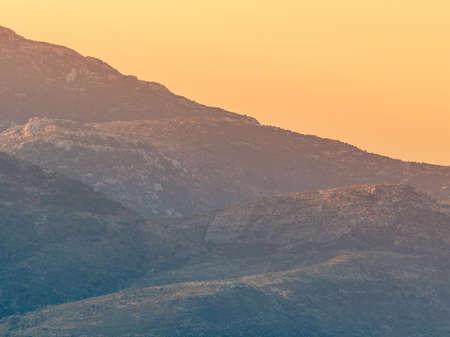 Big huge mountain against summer sunset sky. Beauty in Greece nature concept.の写真素材