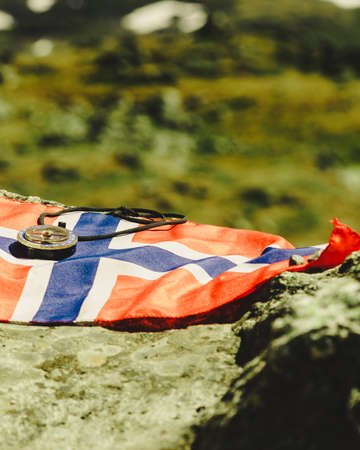 Compass on norwegian flag. Travel, tourism and exploration.の写真素材