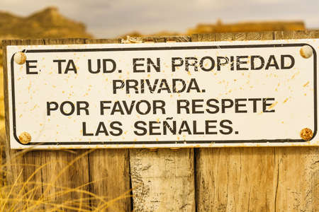 Sign indicating privacy, board with spanish text private at San Ramon castle, province Almerï¿½a, Andalusia region Spain, Europe. Tourist site.の写真素材