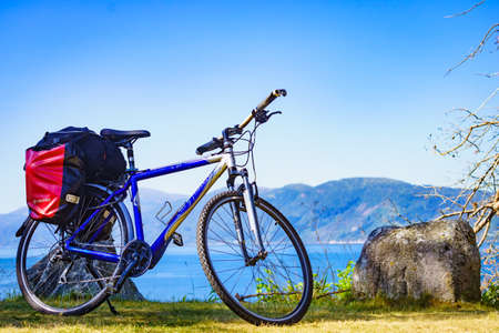 ERESFJORD, NORWAY - JULY 27, 2018: Mountain bicycle against nature, mountains fjord landscape. Eidsvag More og Romsdal county, Norway.のeditorial素材