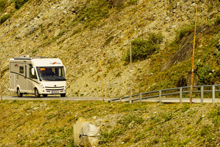SOGNEFJELLET, NORWAY - JULY 7, 2018: Camper car Carthago drive in mountains on National Tourist Route Sognefjellet.のeditorial素材