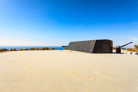 Tourist site. Battery de Castillitos in Spain Cartagena, Cabo Tinoso. Military cannon for coast defense, naval gun batteries. Guns of Mazarron.の写真素材