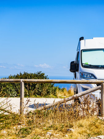 Camper with thermal screen blind at window pane on mediterranean coast in Spain. Camping on nature....