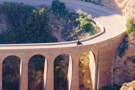 View from Granatilla Carboneras Viewpoint of hilly landscape, curved road and large viaduct. Cabo de...