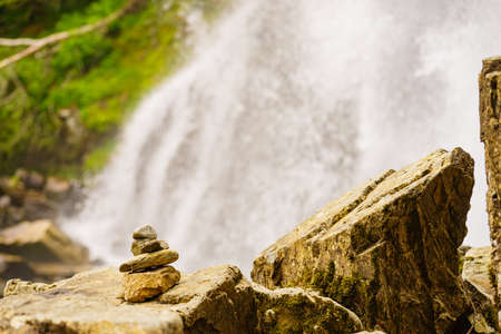 Mountains rocky landscape. Stone stack and waterfall, norwegian natureの写真素材
