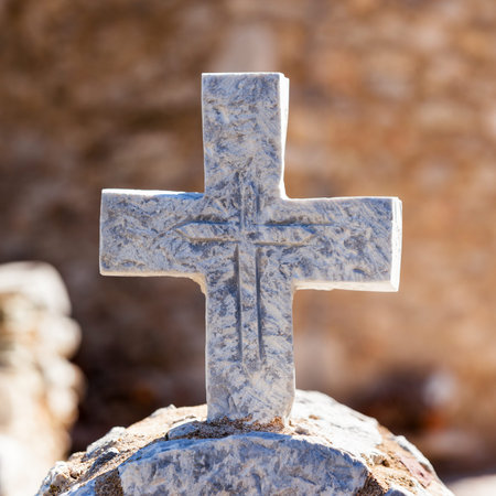 Greek stone cross on burial ground, architecture detail, Vathia Mani Greeceの写真素材