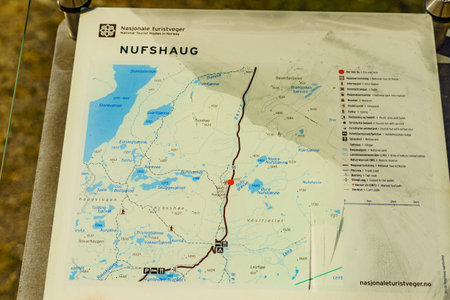 SOGNEFJELLET, NORWAY - JULY 7, 2018: Nufshaug information board. Nufshaugen Oppland is a hill on...