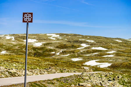 AURLANDSFJELLET, NORWAY - JUNE 27, 2018: The Norwegian Scenic Routes trademark logo sign at Aurlandsfjellet tourist route in region between Aurland and Laerdal.のeditorial素材