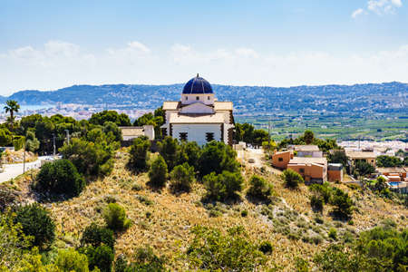 Thel Calvary chapel in Javea town.. Mediterranean landscape on Costa Blanca, Alicante province in southeastern Spain.の写真素材