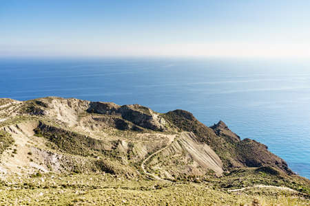 Old olive tree and mountains rocky landscape, Alicante province, Costa Blanca holiday, Spainの写真素材