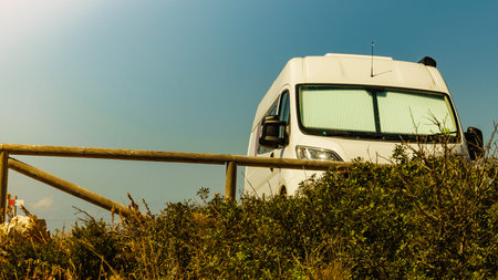 Camper with thermal screen blind at window pane on mediterranean coast in Spain. Camping on nature....