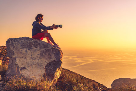 Female tourist traveler with camera taking travel picture from coastal spanish landscape, Mesa...