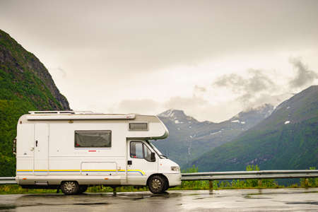 GEIRANGER, NORWAY - JULY 29, 2018: Fiat Ducato motor home on road over Geiranger fjord, Norway.のeditorial素材