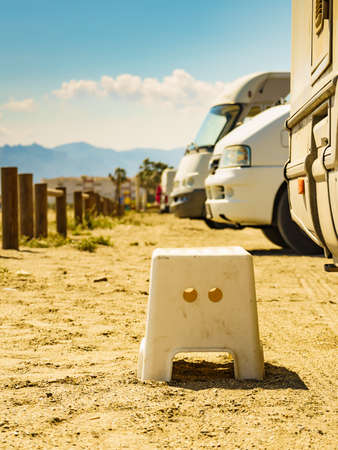 Step at camper car, camping on beach. Travel in motorhome, holidays.の写真素材